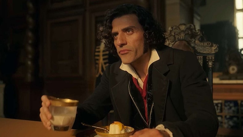 Frankenhole - Victor (Oscar Isaac) patiently waits for his turn to speak in Frankenstein (2025) Netflix
