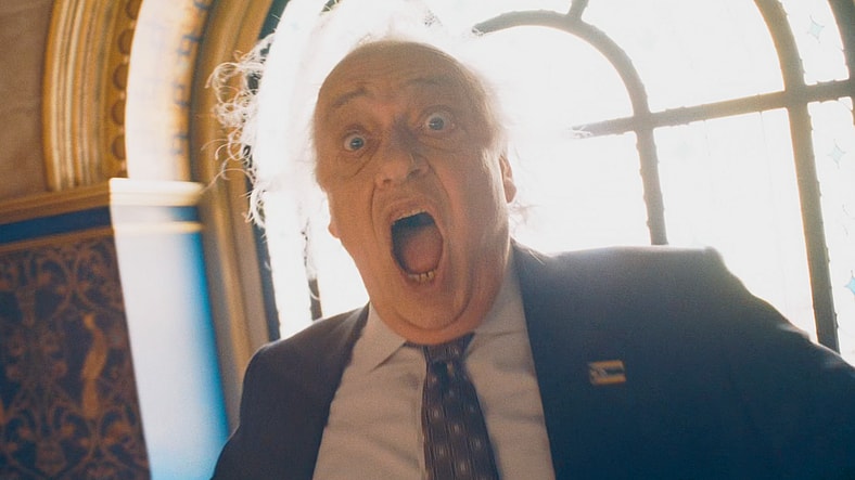 Boravian Prime Minister Vasil Ghurkos (Zlatko Burić) recoils in fear as Hawkgirl (Isabela Merced) closes in on him in Superman (2025), DC Studios