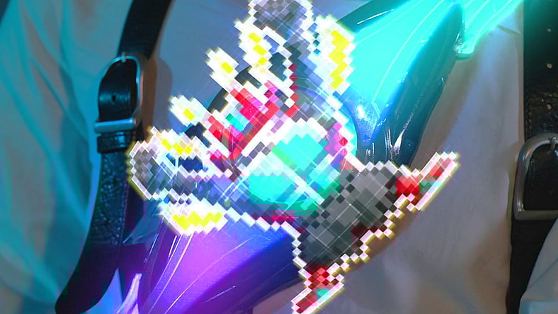 Baku Yorozu (Ryutaro Imai) activates the Impact Capsem in Kamen Rider Zeztz Case 1 "Start" (2025), Toei Co. Ltd.