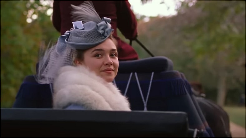 Amy March (Florence Pugh) riding in a horse buggy in Little Women, 2019, Sony Pictures