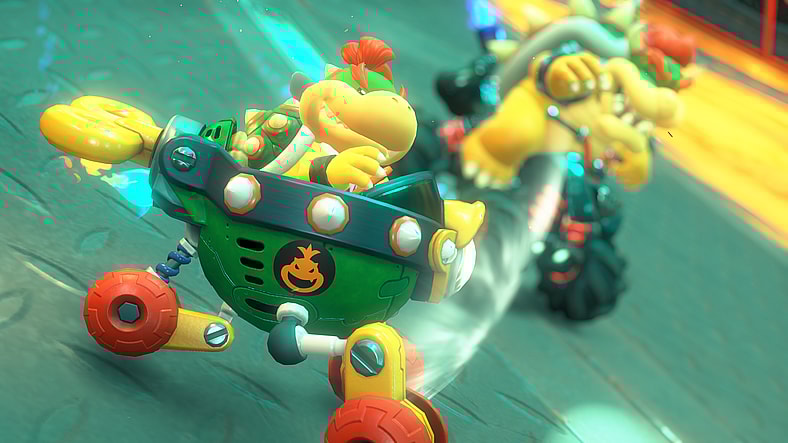 Bowser Jr. (Caety Sagoian) races alongside Bowser (Kenny James) in Mario Kart World (2025), Nintendo