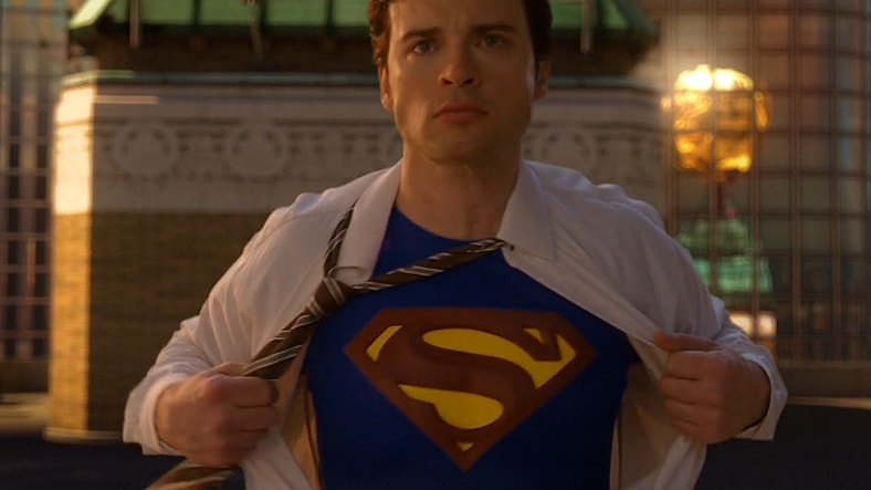 Clark Kent (Tom Welling) rips his shirt open to reveal the iconic symbol of the House of El in Smallville Season 10 Episode 22 "Finale Part 2" (2011), Warner Bros. Television
