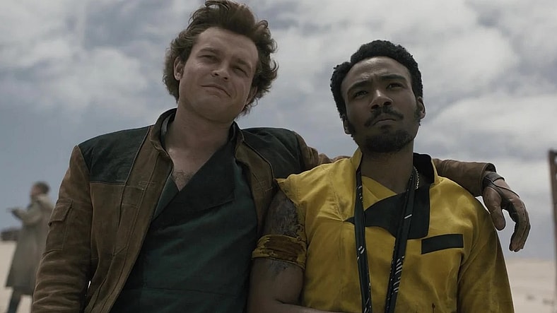 Han Solo (Alden Ehrenreich) takes a breather with Lando Calrissian (Donald Glover) in Solo: A Star Wars Story (2018), Lucasfilm