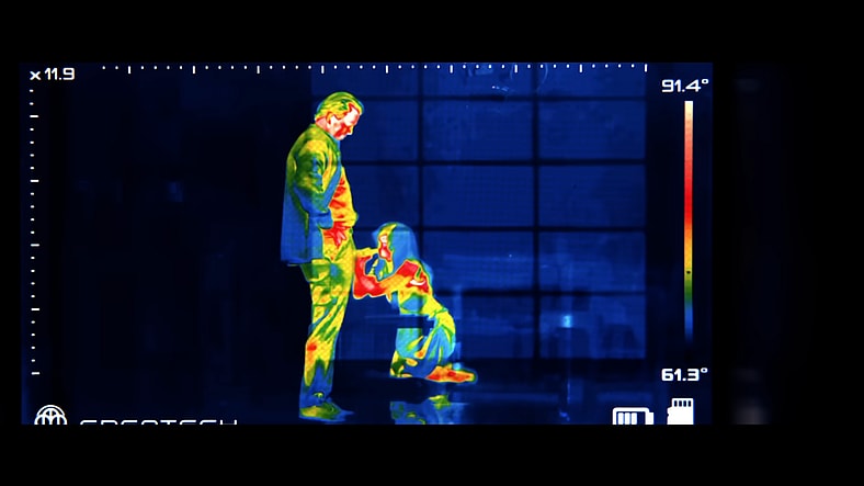 Frank Drebin Jr. (Liam Neeson) and Beth Davenport (Pamela Anderson) spend time together in The Naked Gun (2025),