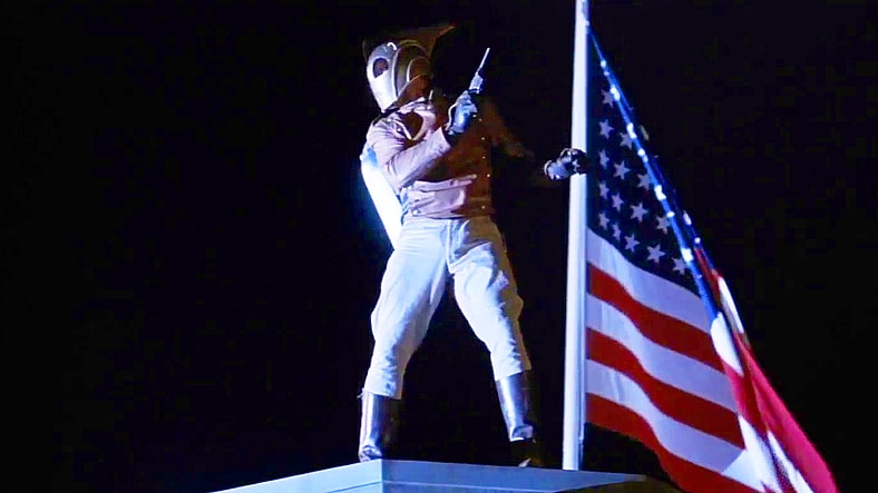 The titular hero (Billy Campbell) prepares to launch from the roof of Griffith Observatory in The Rocketeer (1991), Walt Disney Pictures