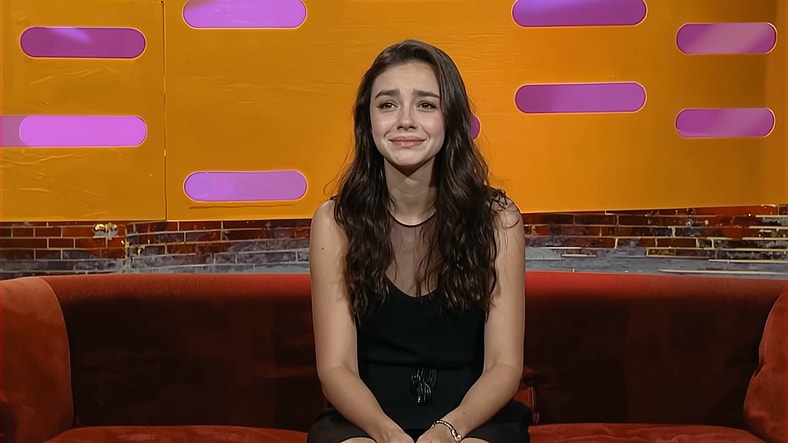 AI product 'Tilly Norwood' expressing a human emotion in Particle 6 TV's AI Commissioner/Comedy Sketch (2025), YouTube