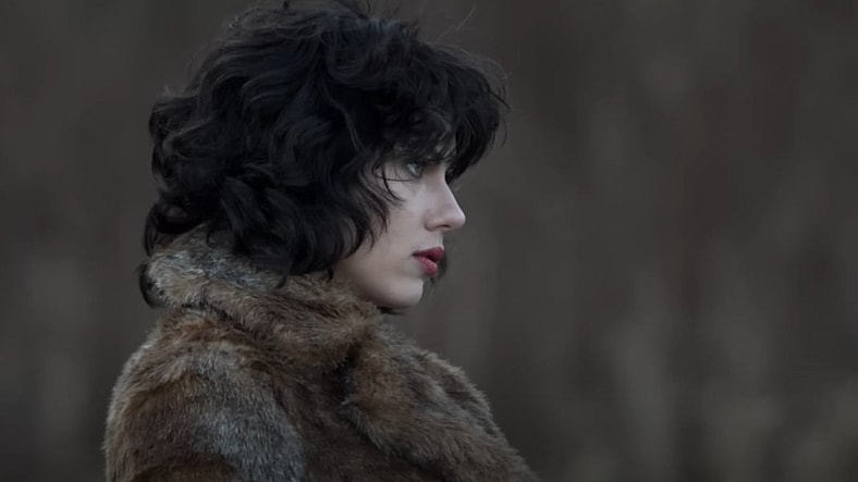 The Female (Scarlett Johansson) looking at the swimmer in Under the Skin (2013), A24