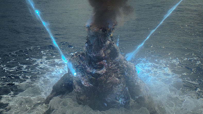 The headless corpse of Godzilla disintegrates into atomic nothingness in Godzilla Minus one (2023), Toho Co. Ltd.