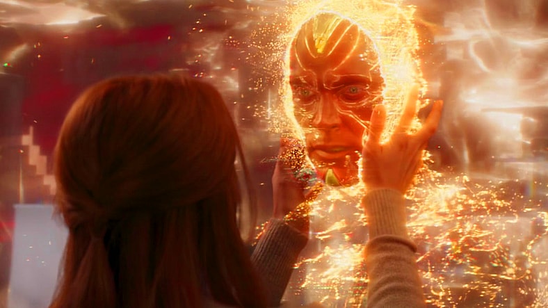 Vision (Paul Bettany) says good-bye to the Scarlet Witch (Elizabeth Olsen) as he returns to the Soul Stone in WandaVision Season 1 Episode 9 "The Series Finale" (2021), Marvel Entertainment