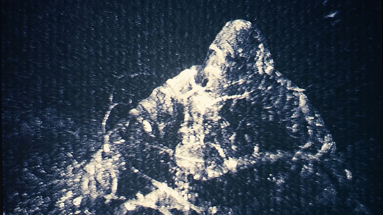 Simon (Markiplier) captures an x-ray image of an unknown entity in Iron Lung (2025), Markiplier Studios