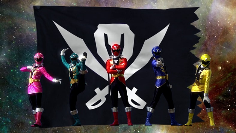 The titular team strike a pose as they prepare to finish off Los Dark (Kenji Utsumi) in
Kaizoku Sentai Gokaiger the Movie: The Flying Ghost Ship (2011), Toei Co. Ltd.