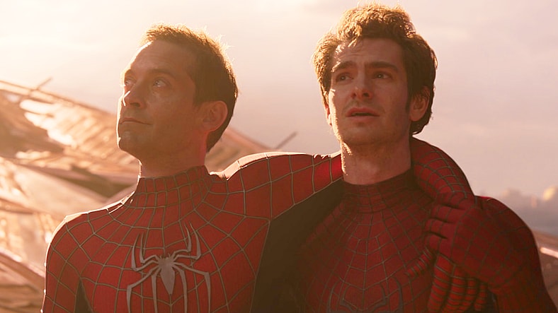 Peter 2 (Tobey Maguire) and Peter 3 (Andre Garfield) bid farewell to Earth-99999 in Spider-Man: No Way Home (2021), Marvel Entertainment