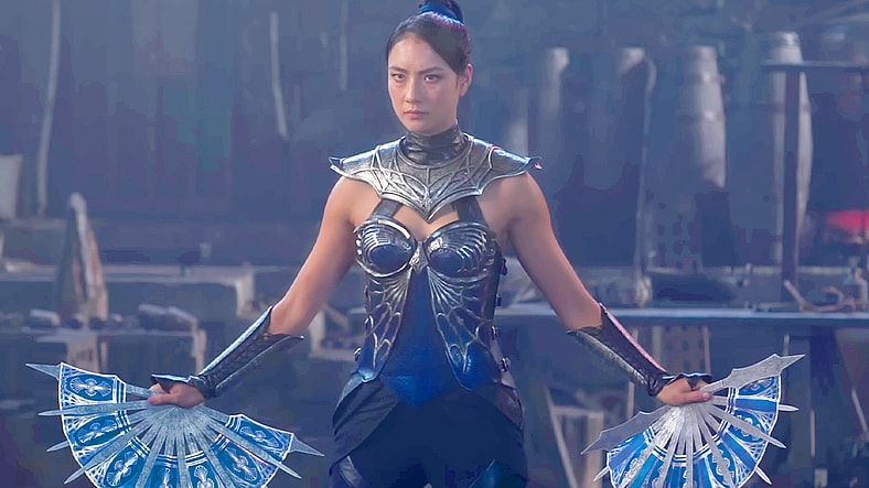 Kitana (Adeline Rudolph) prepares for a fight against Johnny Cage (Karl Urban) in Mortal Kombat II (2025), Warner Bros. Entertainment