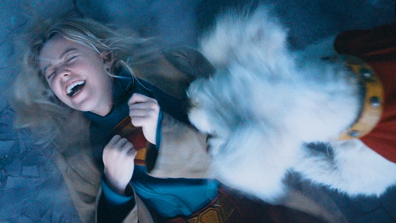 Supergirl (Milly Alcock) basks in Krypto's affection in Superman (2025), DC Studios