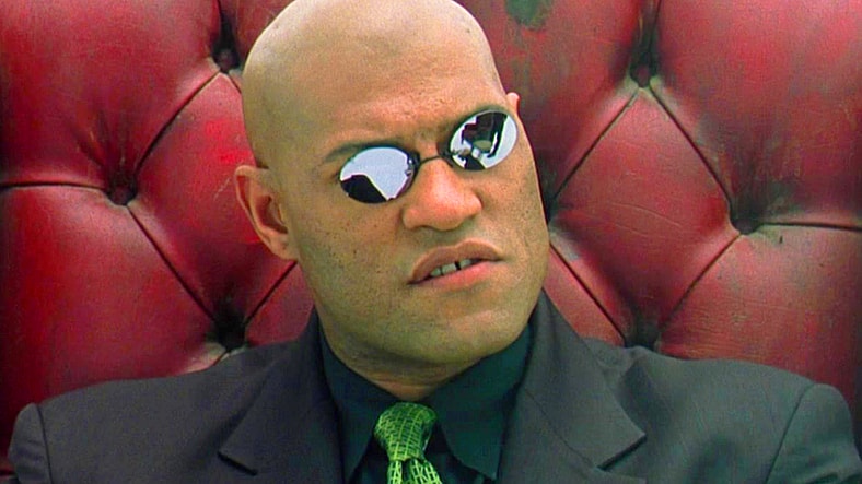 Morpheus (Laurence Fishburne) explains Neo's (Keanu Reeves) new reality in The Matrix (1999), Warner Bros. Pictures