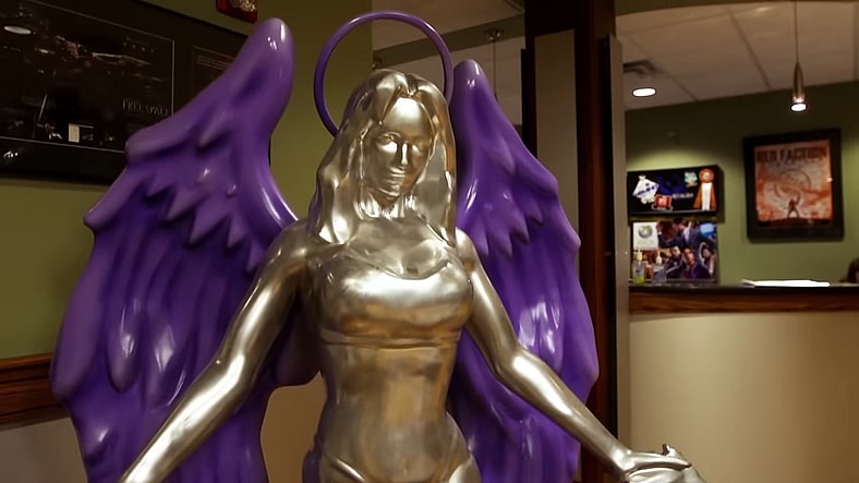 The Saint of all Saints statue in My 2019 Visit to Volition & the Saints Row We Never Got (Part 1) (2025), YouTube