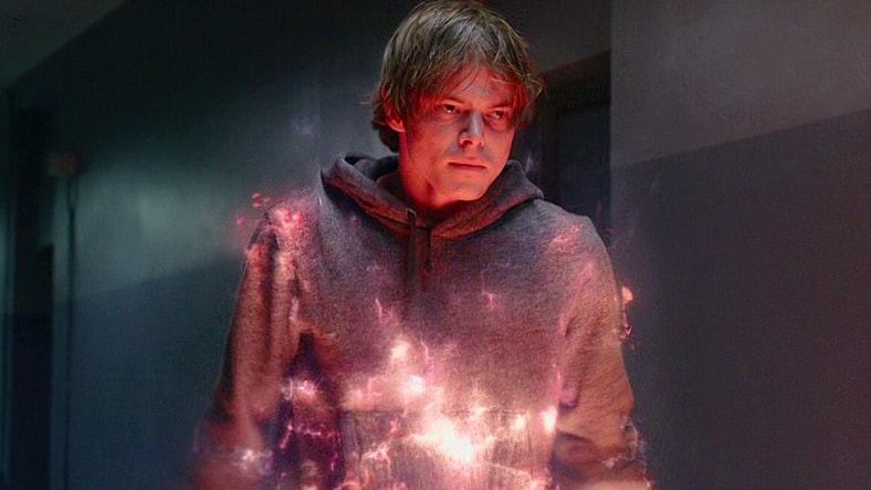 Sam Guthrie (Charlie Heaton) prepares to barrel through a pair of Smiling Men in The New Mutants (2020), Marvel Entertainment