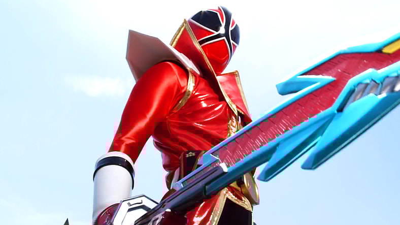 Takeru Shiba (Tori Matsuzaka) activates Hyper Mode with the help of the Kyoryumaru in Samurai Sentai Shinkenger the Movie: The Fateful War (2009), Toei Co. Ltd.