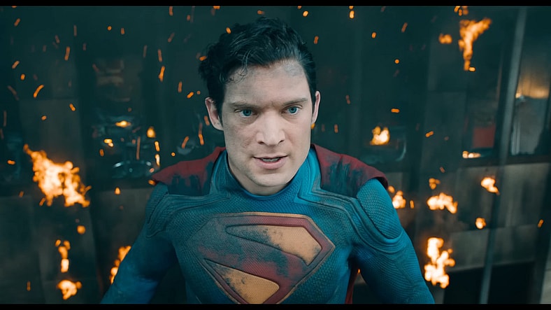 Superman (David Corenswet) tanks a laser blast to the face from the Hammer of Boravia (TBA) in Superman (2025), DC Studios