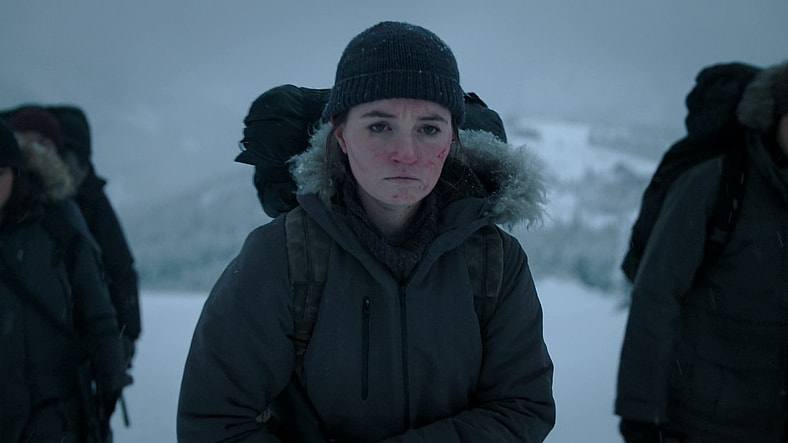 Abby (Kaitlyn Dever) leads the Fireflies away to their next objective in The Last of Us Season 2 Episode 2 "Through the Valley" (2025), HBO