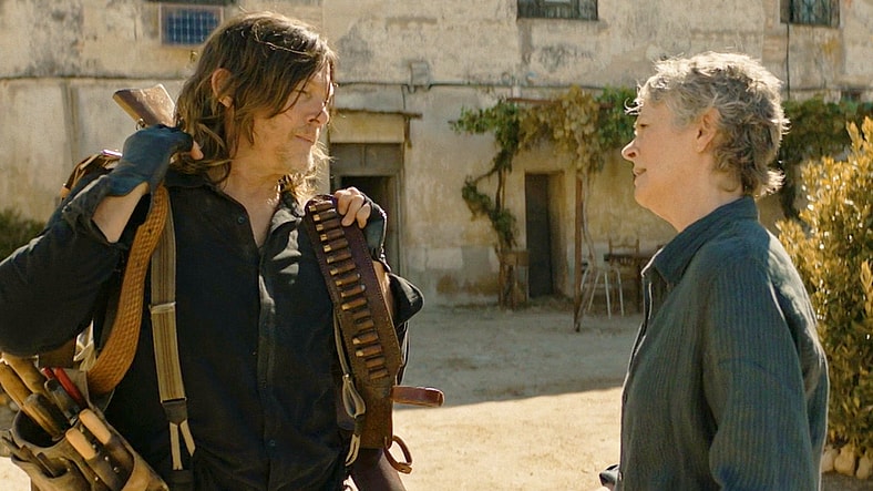 Daryl (Norman Reedus) assures Carol (Carole Peletier) he'll be fine making a quick trip to Julian's (Stephen Merchant) boat in The Walking Dead: Daryl Dixon Season 3 Episode 3 "El Sacrificio" (2025), AMC