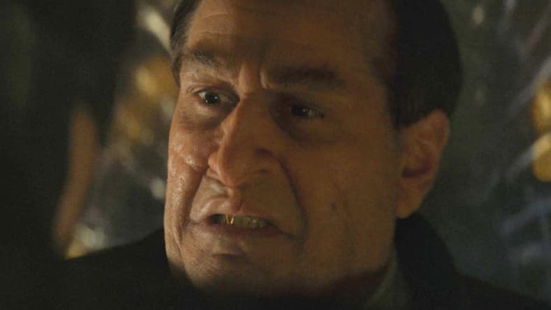 The Dark Knight (Robert Pattinson) demands answers from The Penguin (Colin Farrell) in The Batman (2022), Warner Bros. Pictures