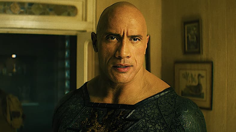 Black Adam (Dwayne Johnson) and Hawkman (Aldis Hodge) are about to settle their differences in Black Adam (2022), Warner Bros. Pictures