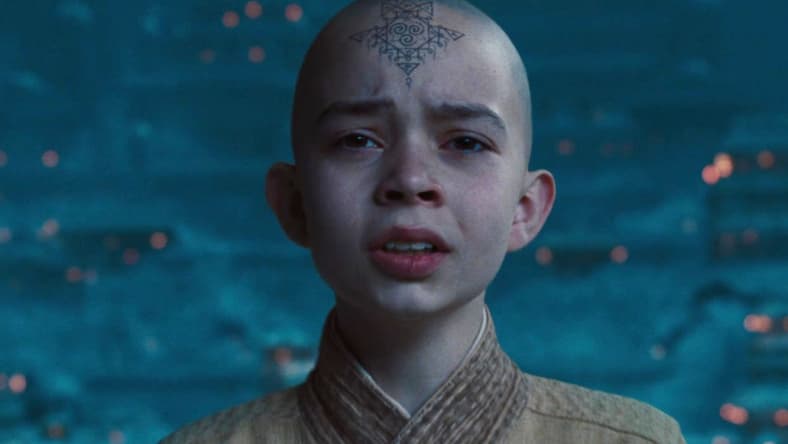 Aang (Noah Ringer) looks out on the destruction caused by the Fire Nation in The Last Airbender (2010), Paramount Pictures
