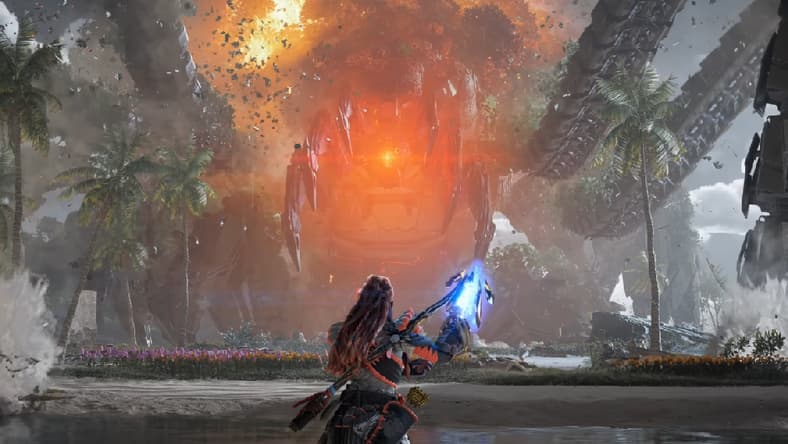 Aloy (Ashly Burch) stands before a Metal Devil via Horizon Forbidden West: Burning Shores (2023), Sony Interactive Entertainment