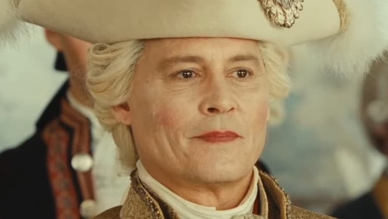 Louis XV (Johnny Depp) is stricken by Jeanne du Barry (Maïwenn) in Jeanne du Barry (2023), La Pacte
