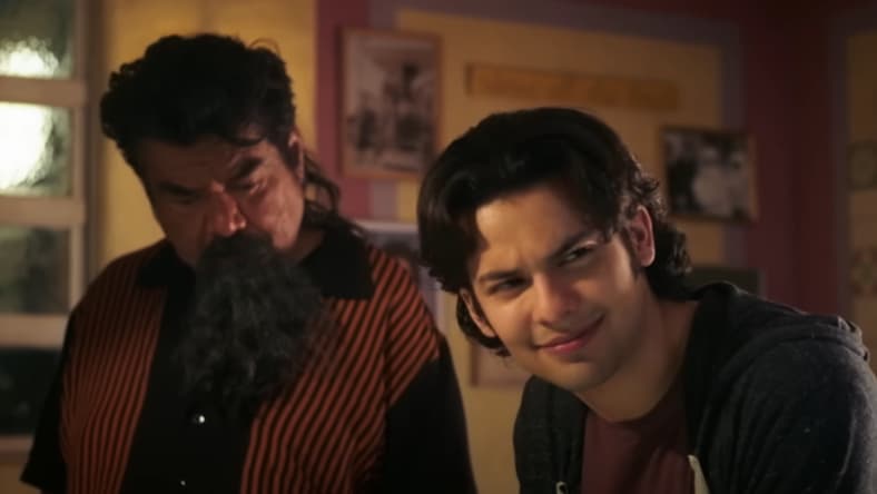 George Lopez as Uncle Rudy and Xolo Maridueña as Jaime Reyes in Blue Beetle (2023), DC Studios
