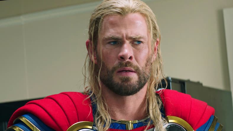 Thor (Chris Hemsworth) receives some bad news in Thor: Love and Thunder (2022), Marvel Entertainment