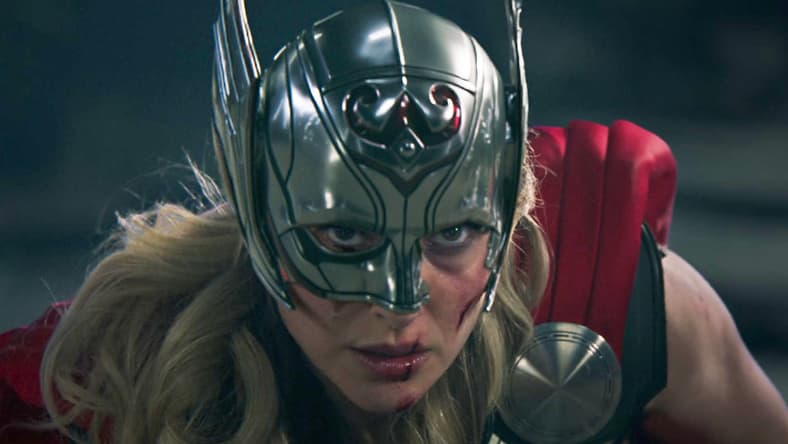 Jane Foster (Natalie Portman) takes one last swing at Gorr (Christian Bale) in Thor: Love and Thunder (2022), Marvel Entertainment