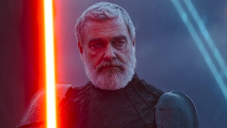 Baylan Skoll (Ray Stevenson) ignites his lightsaber as he prepares to battle Ahsoka Tano (Rosario Dawson) in Ahsoka Season 1 Episode 4 "Fallen Jedi" (2023), Lucasfilm