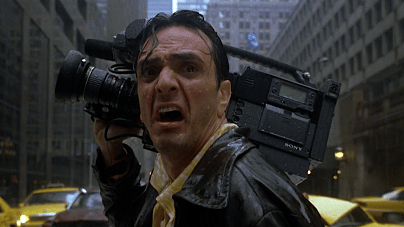 Victor Palotti (Hank Azaria) survives Godzilla's first attack in Godzilla (1998), TriStar Pictures