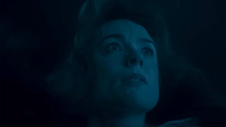 Eve Waller (Kerry Condon) realizes she is far from the surface in Night Swim (2023), Blumhouse