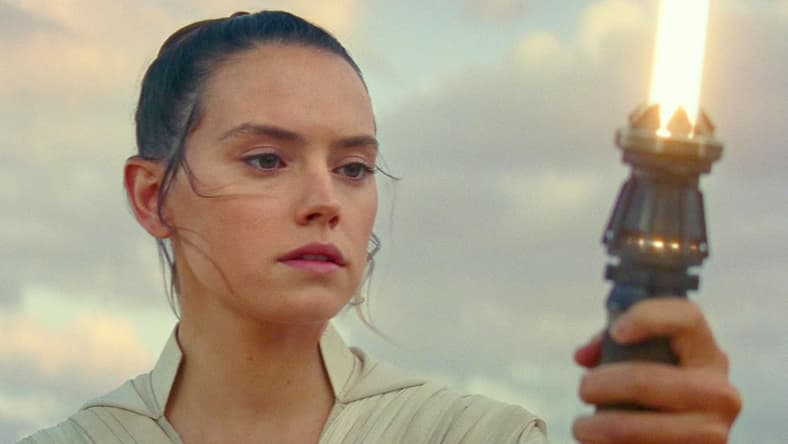 Rey (Daisy Ridley) ignites her lightsaber in Star Wars: Episode IX - The Rise of Skywalker (2019), Disney