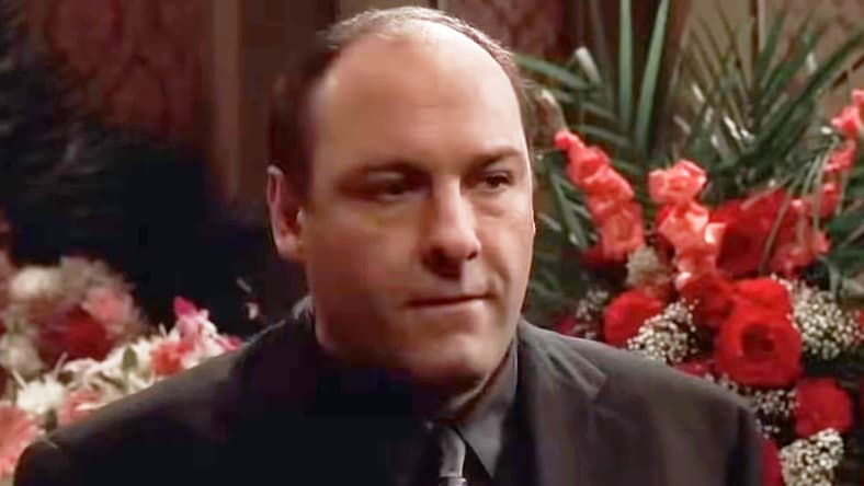 Tony (James Gandolfini) attends the funeral of his grandfather Thomas Giglione Sr. (N/A) in The Sopranos Season 2 Episode 6 "The Happy Wanderer" (2000), HBO