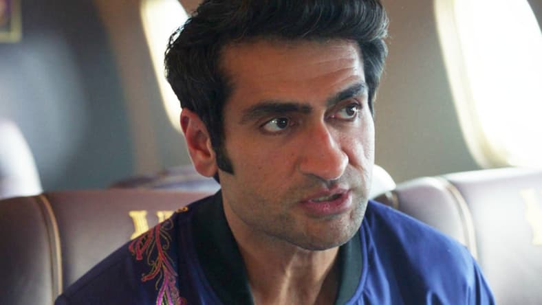 Kingo (Kumail Nanjiani) warns his fellow Eternals about defying Arishem (David Kaye) in Eternals (2021), Marvel Entertainment