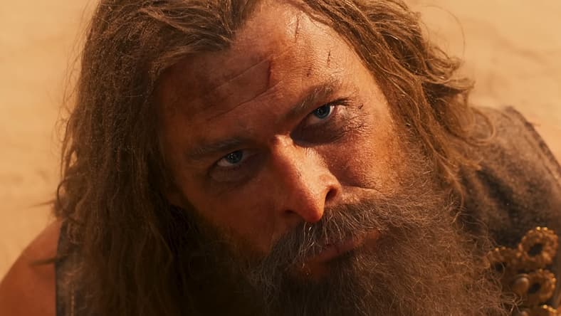 Warlord Dementus (Chris Hemsworth) finds himself at the mercy of the titular heroine (Anya Taylor-Joy) in Furiosa: A Mad Max Saga (2024), Warner Bros. Pictures