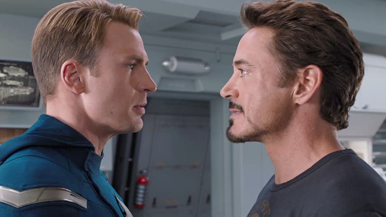 Steve Rogers (Chris Evans) and Tony Stark (Robert Downey Jr.) are at odds in The Avengers (2012), Marvel Studios