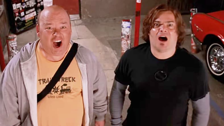 Kyle Gass and Jack Black find themselves in a rock-off against Satan (Dave Grohl) himself in Tenacious D in The Pick of Destiny (2006), New Line Cinema