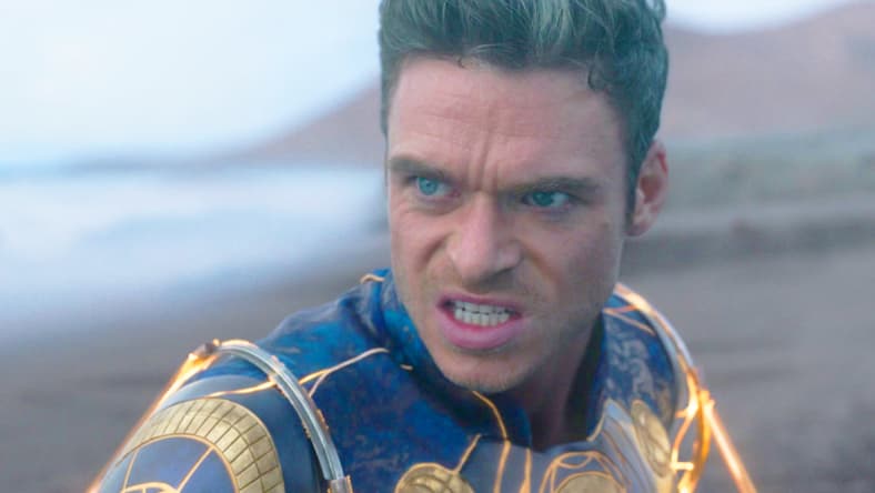Ikaris (Richard Madden) is subdued by Phastos' (Brian Tyree Henry) trap in Eternals (2021), Marvel Entertainment