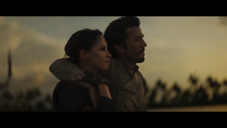 Jyn (Felicity Jones) and Andor (Diego Luna) complete their mission in Rogue One: A Star Wars Story (2016), Lucasfilm
