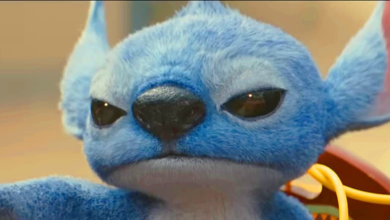 Stitch (Chris Sanders) is not a fan of dog collars in Lilo & Stitch (2025), Disney