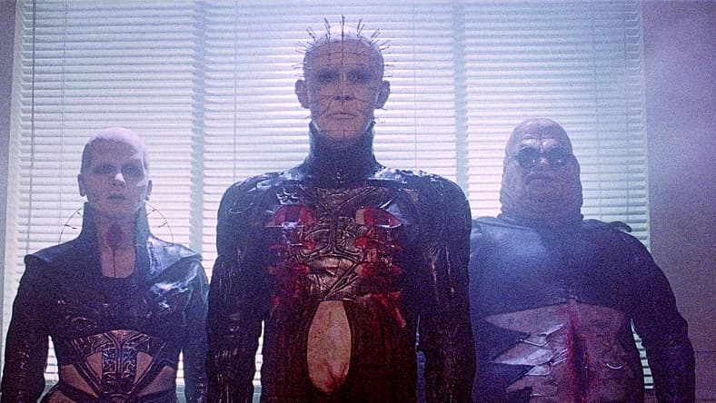 The Female Cenobite (Grace Kirby), "Pinhead," (Doug Bradley) and the "Butterball" in Hellraiser (1987), New World Pictures