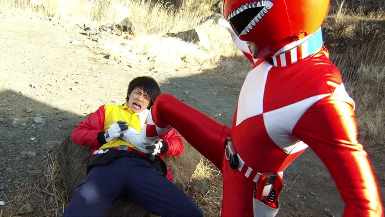 Powerful TyrannoRanger (Tomokazu Seki) overpowers AkibaRed (Masato Wada) in Unofficial Sentai Akibaranger Season 2, Episode 5 "Delusional Imports" (2013), Toei Co. Ltd.