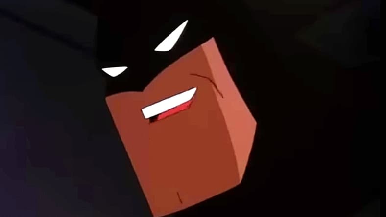 He's smiling
