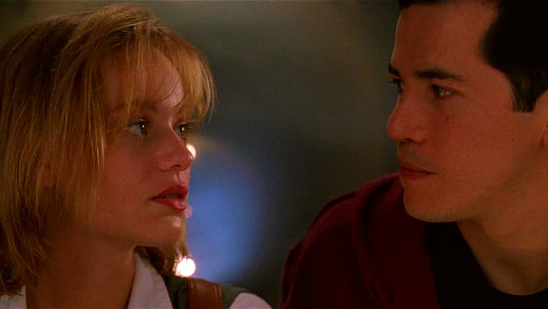 Samantha Mathis and John Leguizamo in Super Mario Bros. (1993), Hollywood Pictures