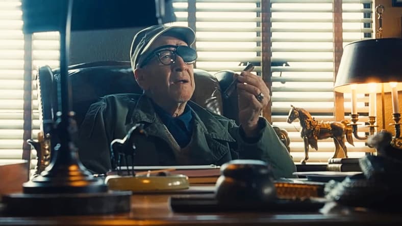 John Ford (David Lynch) enjoys a fine cigar in The Fabelmans (2022), Universal Pictures